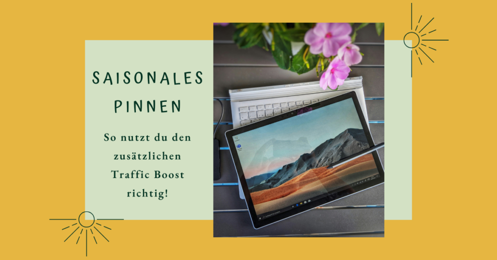 saisonale Inhalte auf Pinterest. Ein Tablet auf einem Tisch mit Tastatur vor einem sommerlichen Blumenstrauß